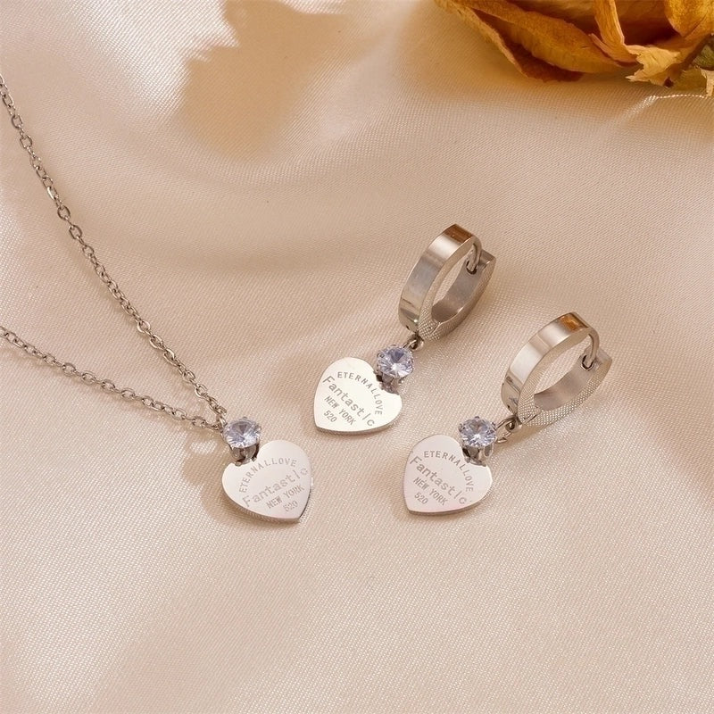 6 / Edelstahl Schmuckset 2-teilig silber- oder goldfarbig Herzstein