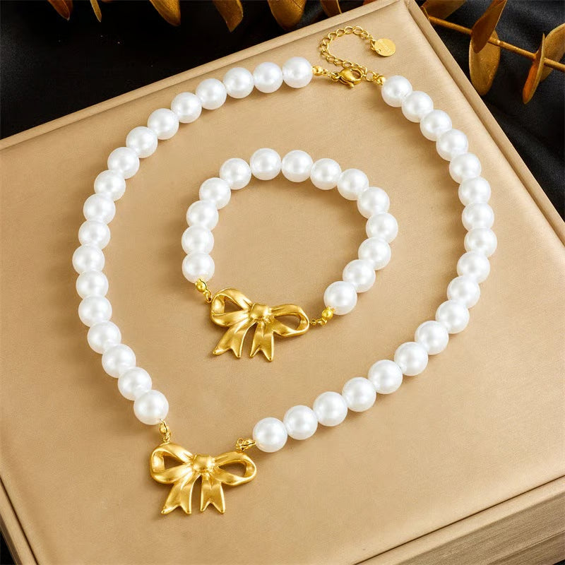 184 Edelstahl Schmuckset Perlenkette und Perlenarmband goldfarbig