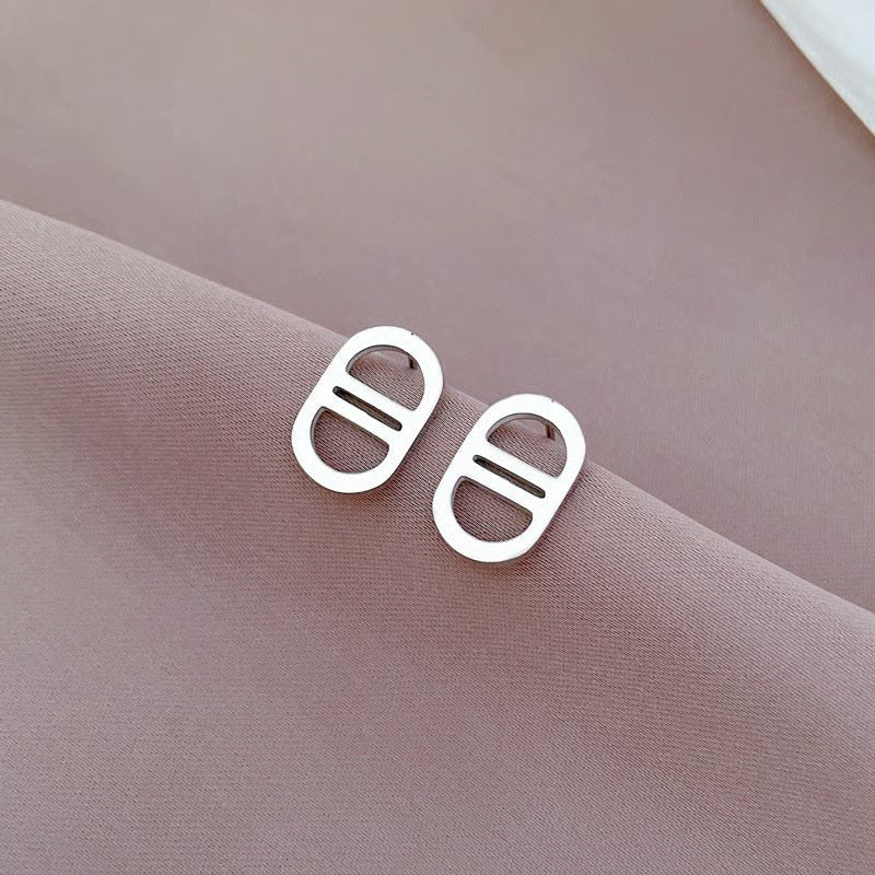171 / Edelstahl Ohrstecker Mellastyle silber- oder goldfarbig Trendsetter