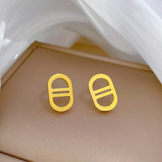 171 / Edelstahl Ohrstecker Mellastyle silber- oder goldfarbig Trendsetter